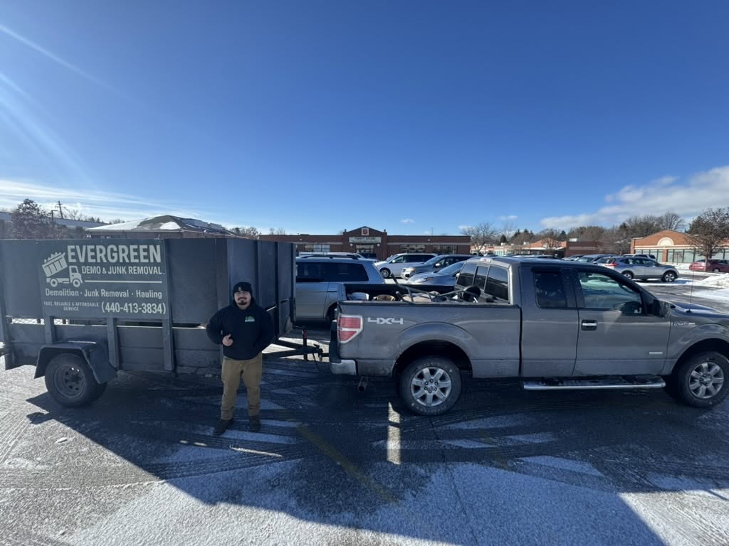 Evergreen owner with branded trailer and pickup truck in Lake County, Ohio